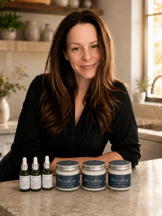 photo of the founder, Jana with nourishing balm and renewal serum in a kitchen.